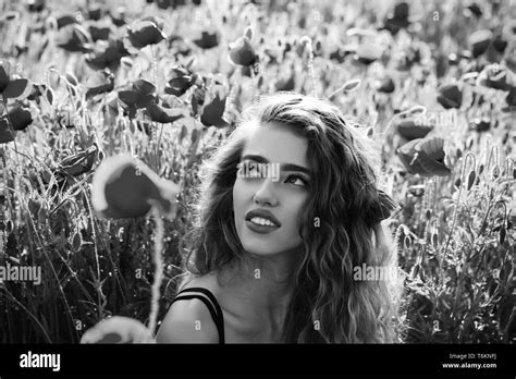 Woman Or Happy Girl In Field Of Poppy Seed Stock Photo Alamy