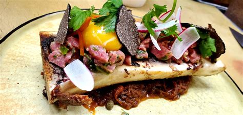 Roasted Bone Marrow Classic Beef Tartare Egg Yolk Braised Short Ribs