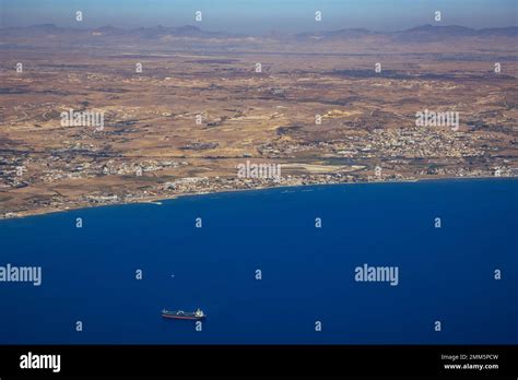 Aerial View From Plane Window With Shore Of Larnaca City And Oroklini