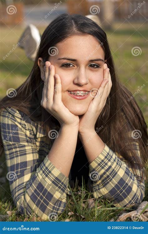 Child with Braces Smiling in a Field Stock Photo - Image of teen, child ...