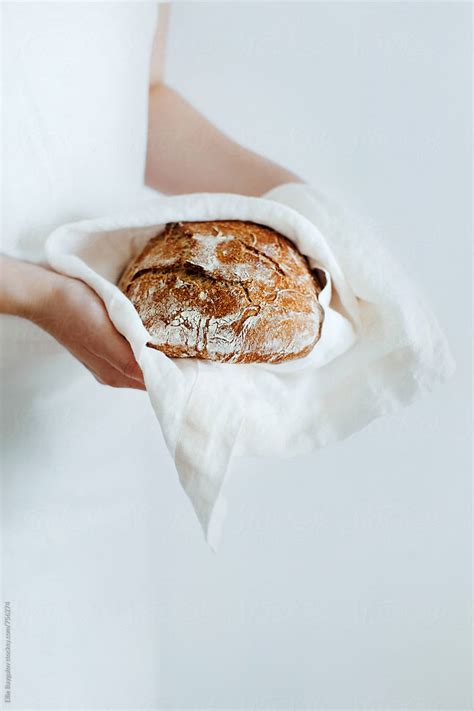 Woman Holding Whole Grain Bread By Stocksy Contributor Ellie