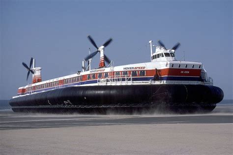 A Large Boat With Three Propellers On The Beach