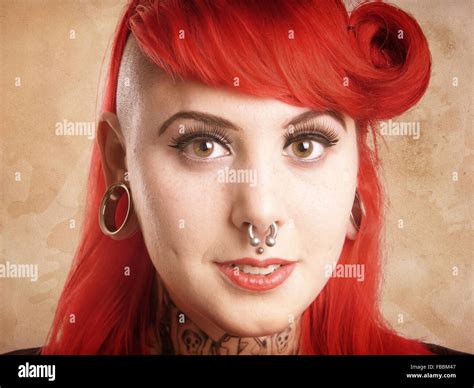 Girl With Piercings And Tattoos Stock Photo Alamy