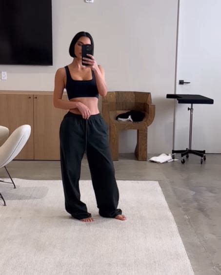 Kourtney Kardashian Nearly Spills Right Out Of Tiny Neon Green Bikini Top As She Lounges By The