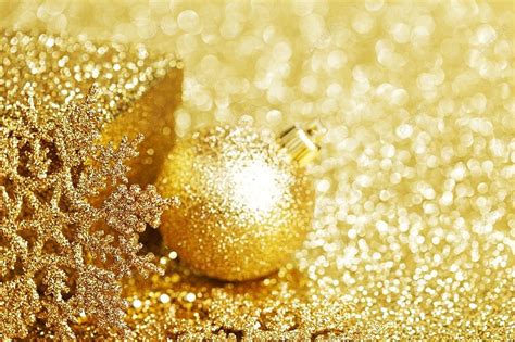 Shiny Golden Christmas Decor Over Glitter Background And Picture For