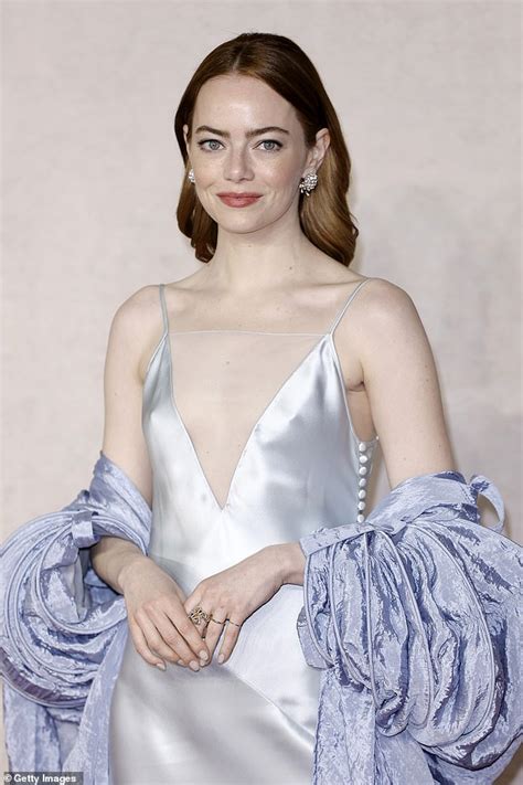 Braless Emma Stone Stuns In A Daringly Plunging Silk Gown As She Graces