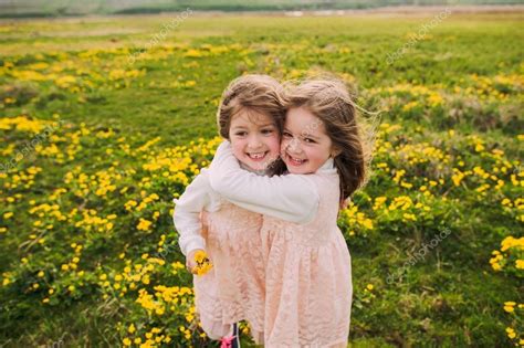 Cute twin sisters Stock Photo by ©Photo_life 107231068