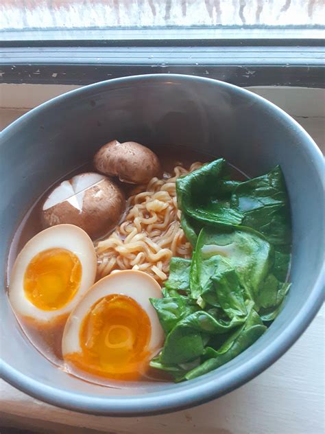 Decided to make instant ramen fancy with some marinated eggs, mushrooms, spinach, and an ...