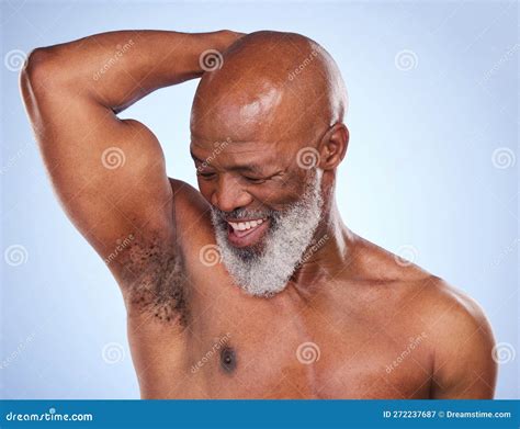 Embrace Your Natural Self Studio Shot Of A Mature Man Drying His Armpit After Applying