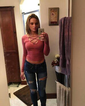 Ripped Jeans And A Tight Top Porn Pic