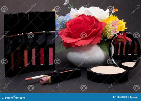 Lipstickpowder And Flowers With Cosmetics For Women To Make Her Stock