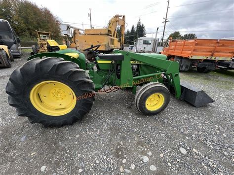 John Deere 1020 Tractor w/ Loader | Live and Online Auctions on HiBid.com