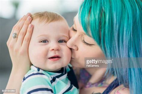 Mother Son Tattoos Imagens E Fotografias De Stock Getty Images