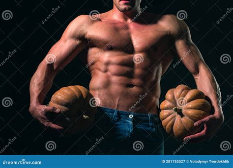 Halloween Man Holding Pumpkin Muscular Athletic Male With Naked Torso