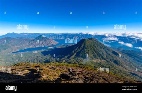 Panorama view of Lake Atitlan and volcano San Pedro and Toliman early ...