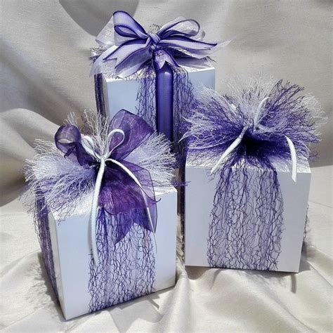 purple gift boxes  elegant ribbons  bows