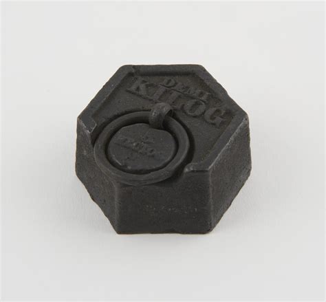 Selection Of Six Hexagonal Iron Weights With Loop Handle 1 Kilogramme