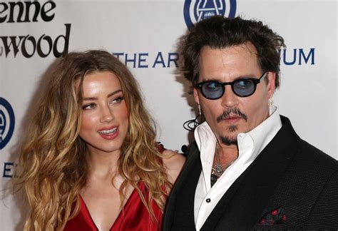 PHOTO Amber Heard accuses Johnny Depp of domestic violence, files a