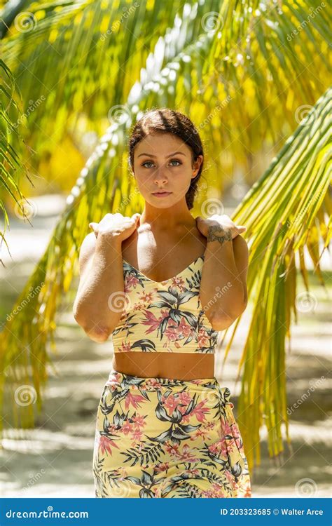 A Lovely Brunette Model Enjoys The Weather While On Vacation In The Yucat N Peninsula Near