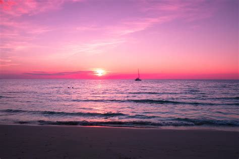 beautiful sunset   beachpink sky  twilight time  reflection
