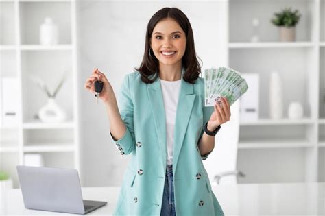 Premium Photo Cheerful Millennial Caucasian Lady Manager In Suit Hold