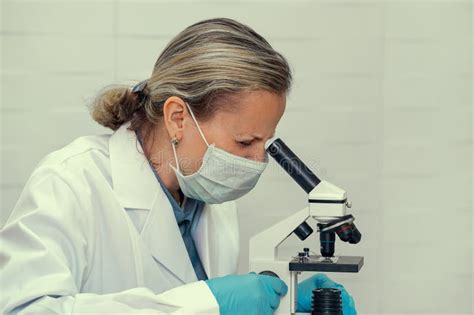 Woman Microscope Serious Female Chemist Working Laboratory Scientist