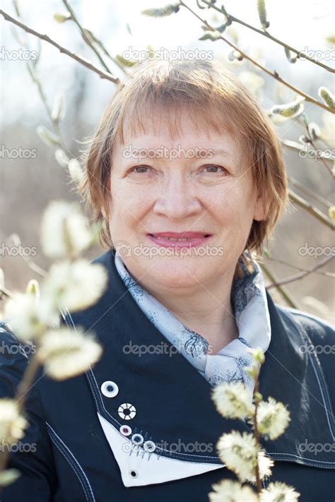 Mature Woman In Spring Pussywillow Stock Photo Jim Filim 25918153
