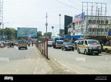 Typical View Of Central Nakuru Town Roads With Vehicles And People