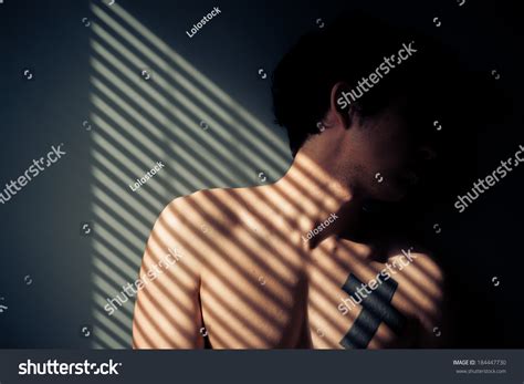 Sad Naked Man Sitting By Window Stock Photo Edit Now