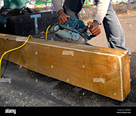 Person using Electric Power Sander Stock Photo - Alamy