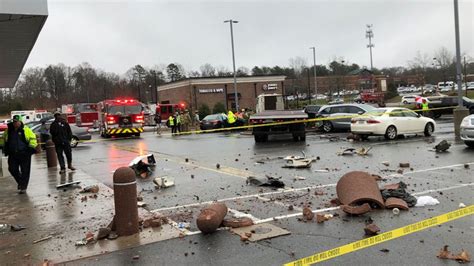 No Injuries After Truck Crashes Through Aldi Parking Lot