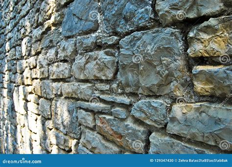 Shaded blue wall stone stock photo. Image of background - 129347430