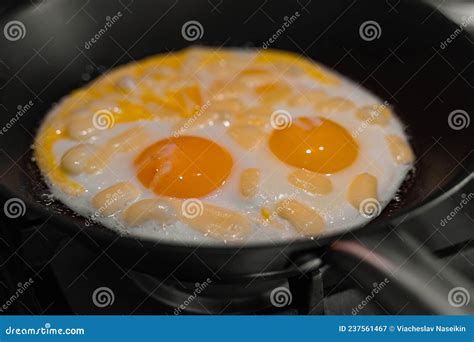 Fried Eggs In A Pan With Butter For Breakfast Or Lunch Simple Cooking Delicious Food With Bread