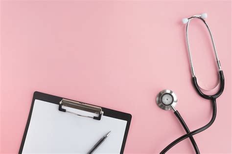 Premium Photo Medical Stethoscope And Blank Clipboard On Pink Table