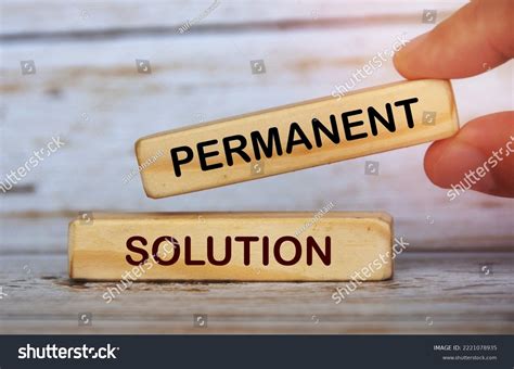 Hand Holding Wooden Blocks Text Permanent Stock Photo 2221078935