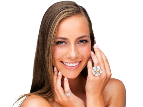 She Takes Skincare Seriously Studio Shot Of A Beautiful Brunette Woman Isolated On White Stock