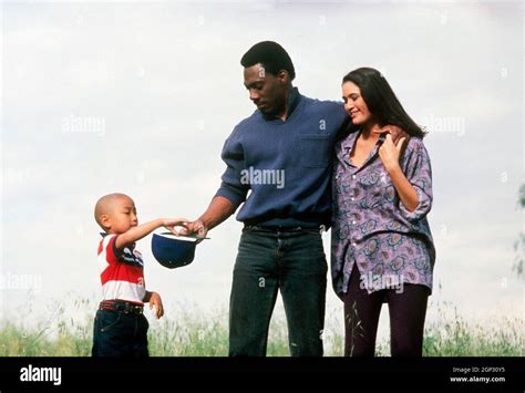 THE GOLDEN CHILD, from left: J.L. Reate, Eddie Murphy, Charlotte Lewis ...