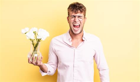 Premium Photo Young Handsome Man Shouting Aggressively Looking Very