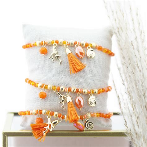 Biba Oranje Kralen Armband Met Kwastje En Schelp Beadle