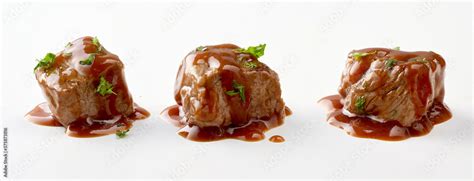 Individual cubes of spicy beef goulash in gravy Stock Photo | Adobe Stock