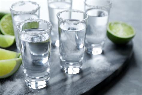 Mexican Tequila Shots Lime Slices And Salt On Table Stock Image