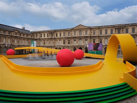 Louis Vuitton Inserts A Yellow Racetrack At The Louvre For Spring