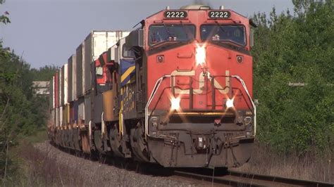 Long Stack Train CN 120 W Rear Ex CREX DPU Passing Painsec Junction At