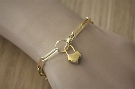 Bracelet acier inoxydable doré avec breloque cadenas coeur