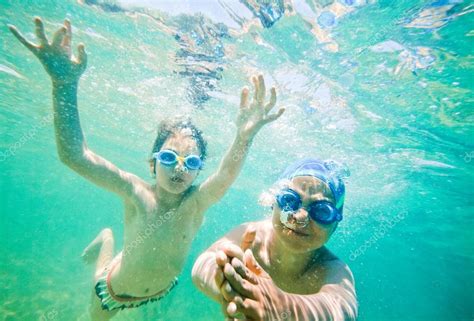 Kids sea underwater Stock Photo by ©vilevi 77475802