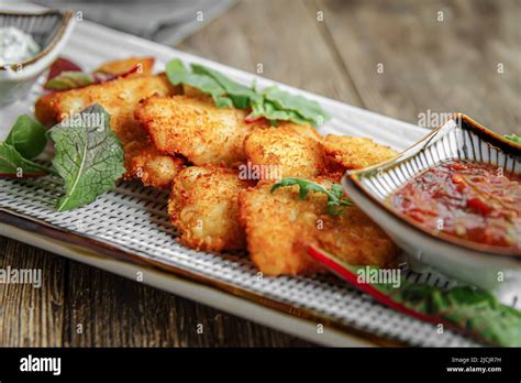 Top View On Portion Of Gourmet Chicken Nuggets Stock Photo Alamy