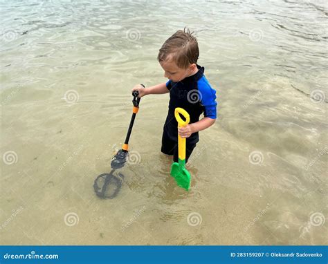 Kids beach vacation stock image. Image of detector, neoprene - 283159207