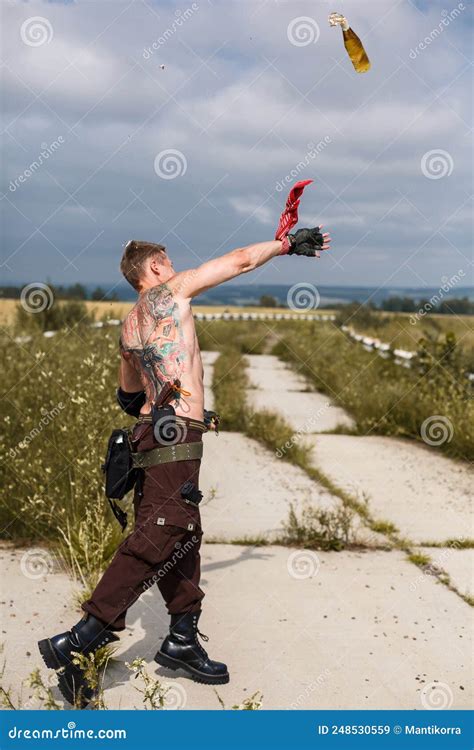 Male Vandal With Dirty Naked Torso Throws Molotov Cocktail Stock Image Image Of Hooligan