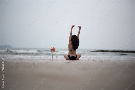 Sexy Beautiful Asian Woman On Beach Summer Vacation In Bikini Sitting On Sand In Holiday Stock
