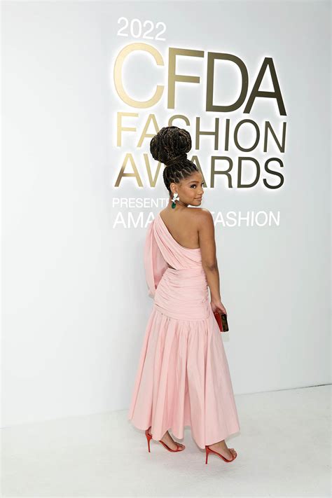 Halle Bailey Pops In Pink High Slit Dress Red Heels At Cfda Awards